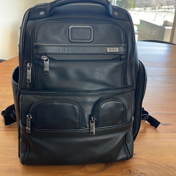 Tumi Handbags - Tumi Compact Laptop Brief Pack Leather